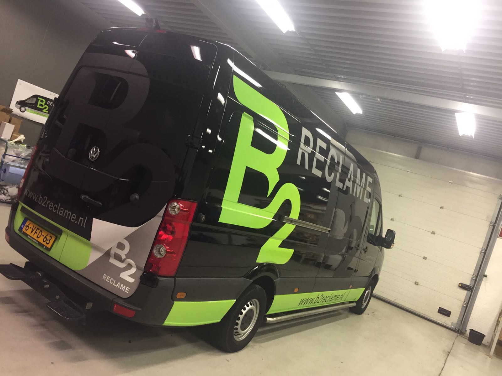 B2 reclame nieuwe belettering